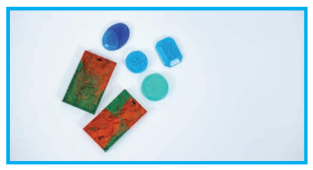 Epoxy charms and buttons in various colors