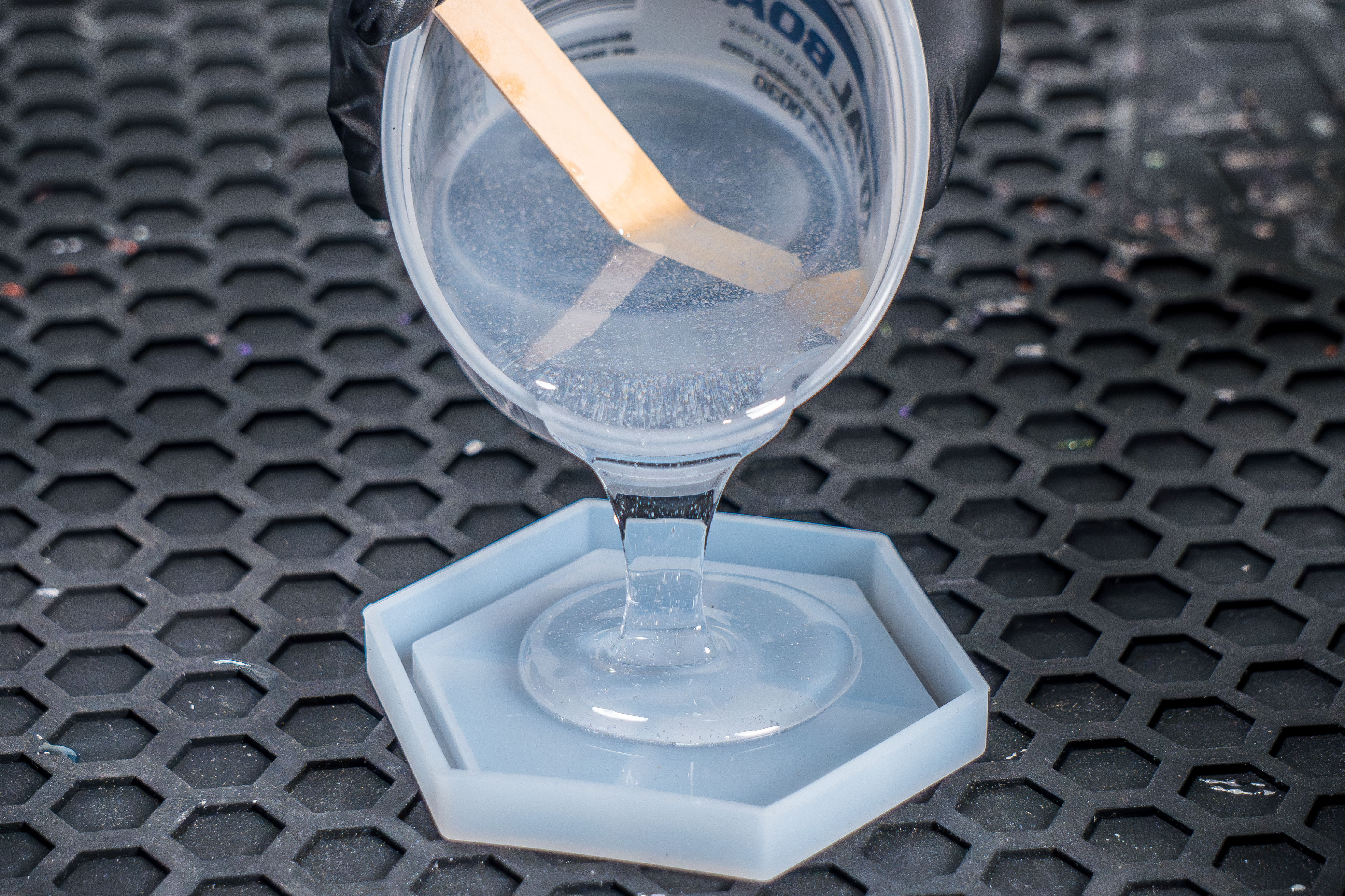 TotalBoat Artist Epoxy Resin being poured into coaster mold